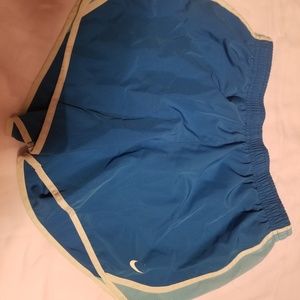 Blue Nike running shorts, girls size large